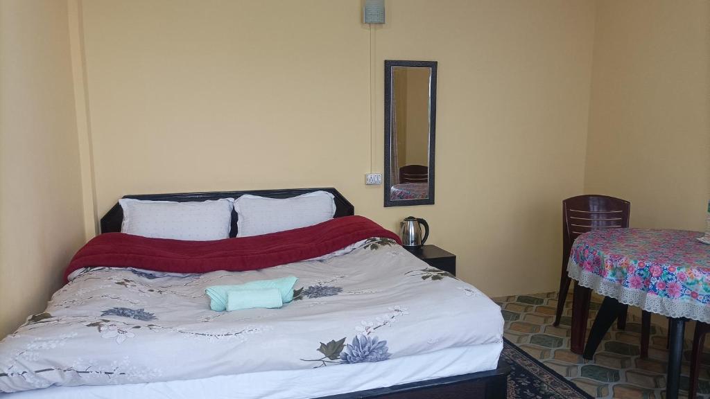 Postel nebo postele na pokoji v ubytování Banabas Homestay