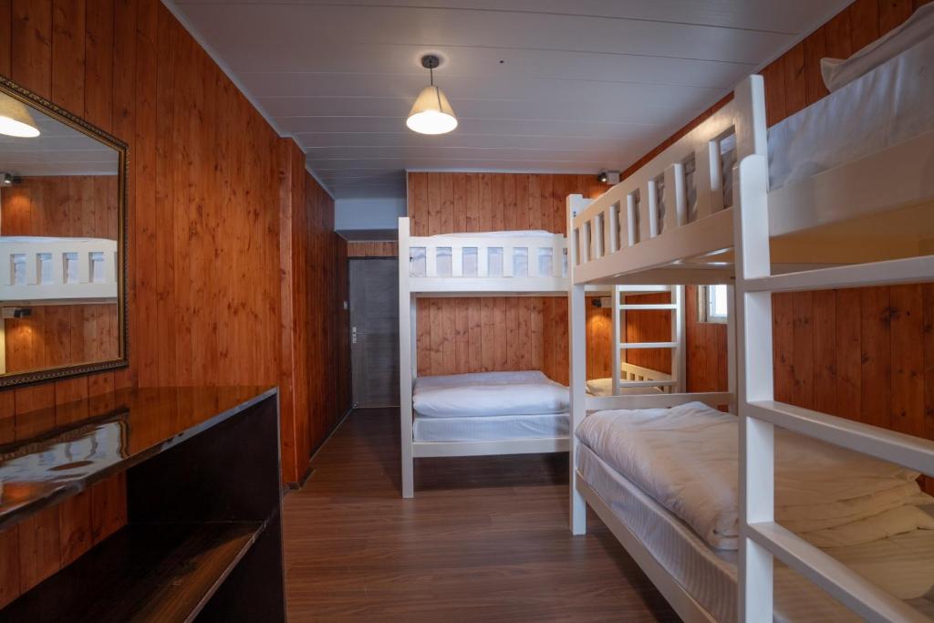Postel nebo postele na pokoji v ubytování Poshtel, Meghma , Sandakphu