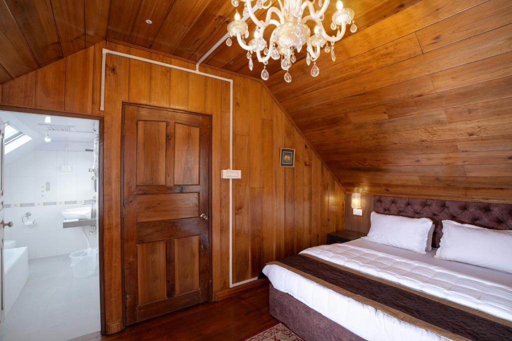 Postel nebo postele na pokoji v ubytování Poshtel, Meghma , Sandakphu