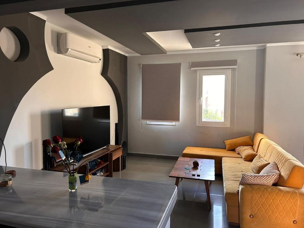 A seating area at Fancy sea view villa with private jacuzzi mountain view north coast Bait Karim - Twin Villa with roof & juccuzi