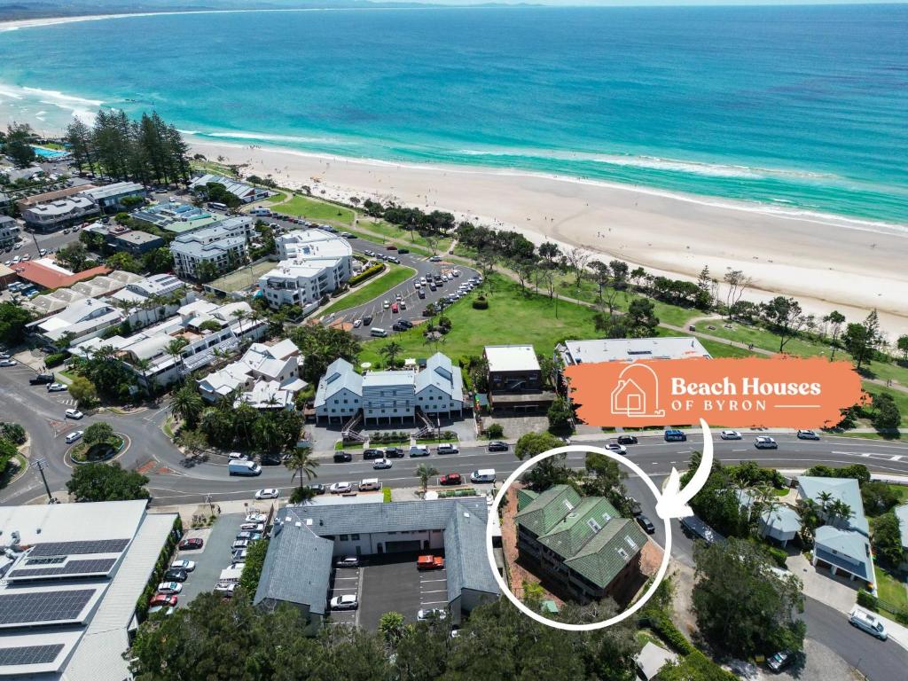 an aerial view of a beach house with a parking lot at Surfers Rest in Byron Bay