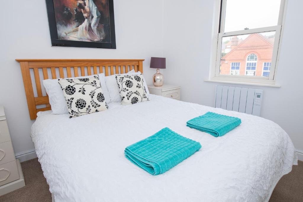 Cama o camas de una habitación en Hummingbird - Spacious One-Bed Apartment