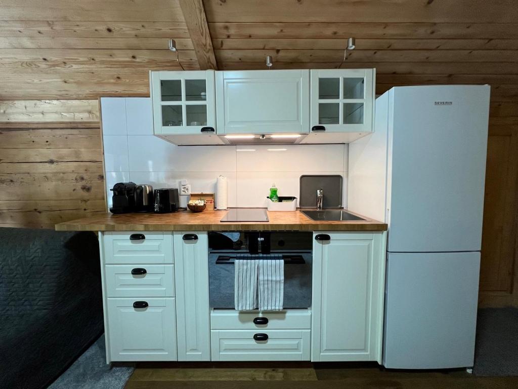 Kuchyň nebo kuchyňský kout v ubytování Haus Bergmann