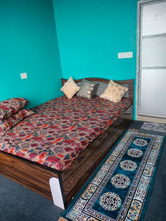 Postel nebo postele na pokoji v ubytování Mukhia's HomeStay Amayras