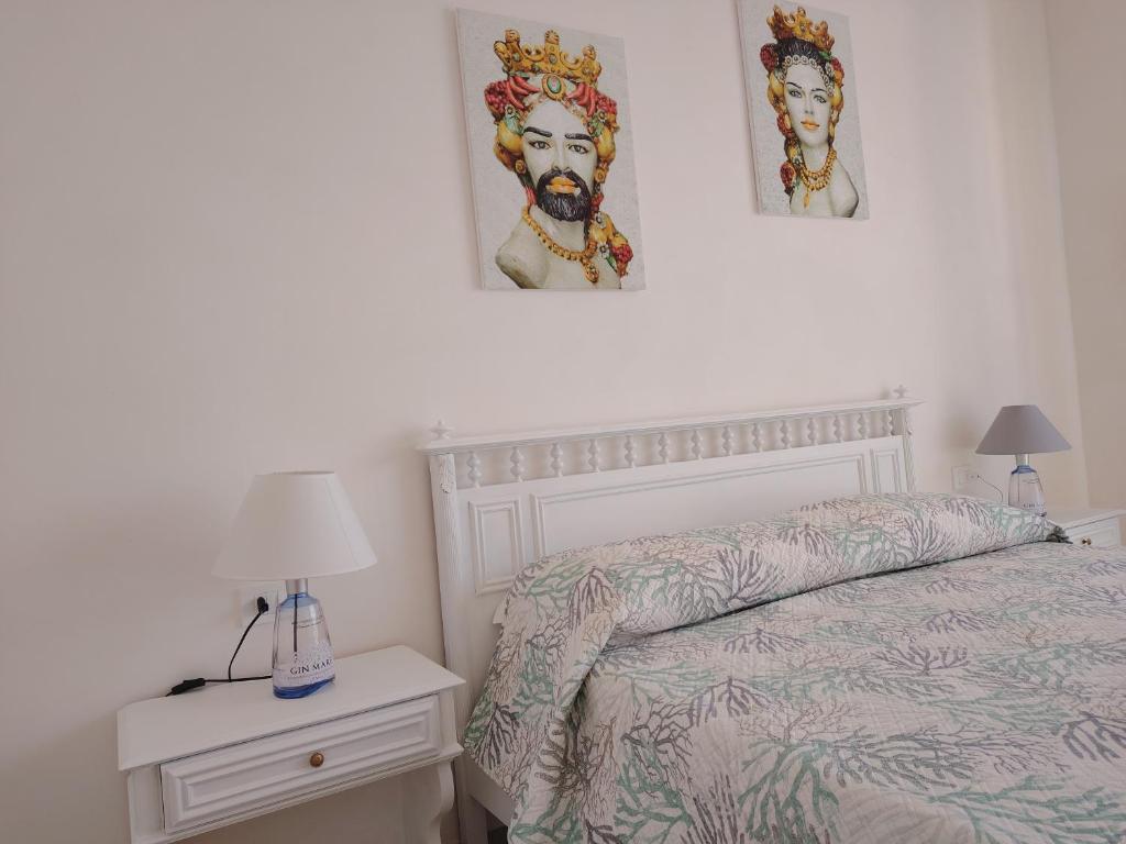 Postel nebo postele na pokoji v ubytování Villetta Scruscio ri Mare