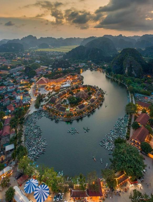 an aerial view of a harbor with boats in the water at Tam Coc Paradise Homestay in Ninh Binh
