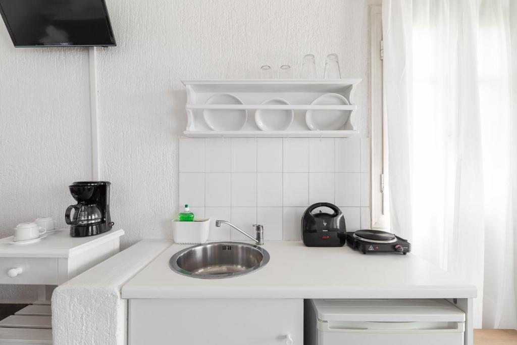 Kuchyň nebo kuchyňský kout v ubytování Fos Apartments Mykonos