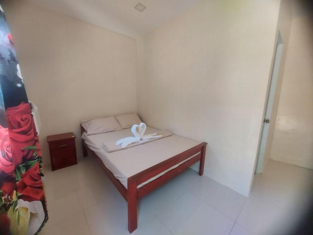 Postel nebo postele na pokoji v ubytování Simala Retreat Resort Cebu