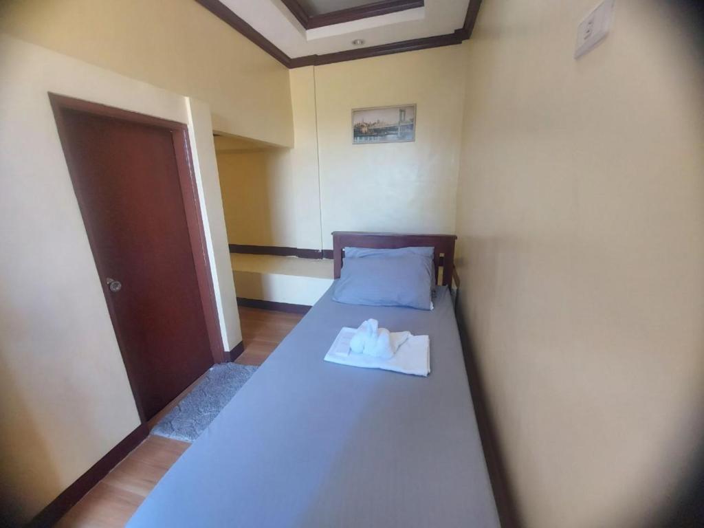 Postel nebo postele na pokoji v ubytování Simala Retreat Resort Cebu