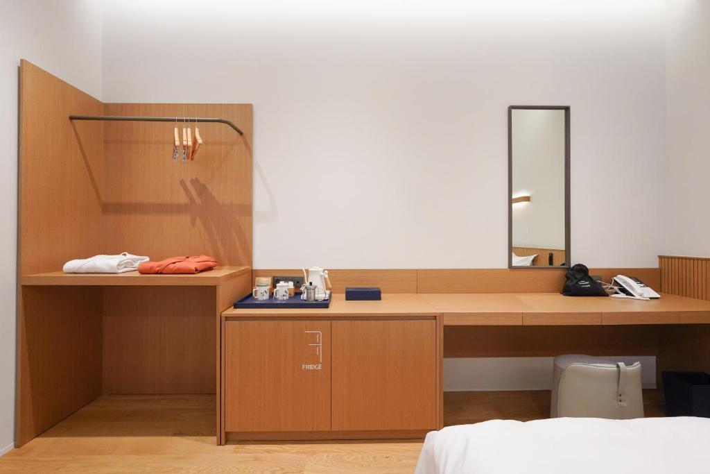 Postel nebo postele na pokoji v ubytování Hotel Ground27
