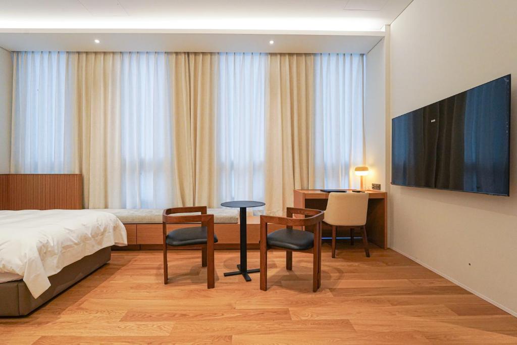 Postel nebo postele na pokoji v ubytování Hotel Ground27