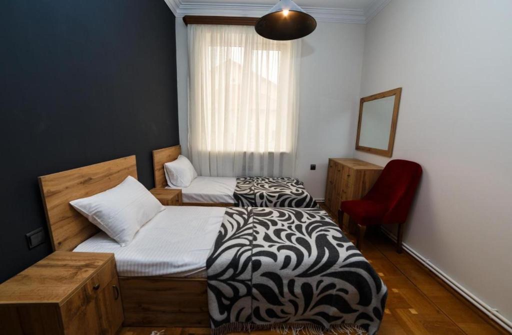 Postel nebo postele na pokoji v ubytování Red castle