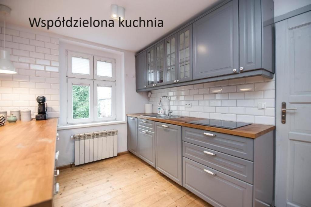 Kuchyň nebo kuchyňský kout v ubytování Pokoje Sienkiewicza