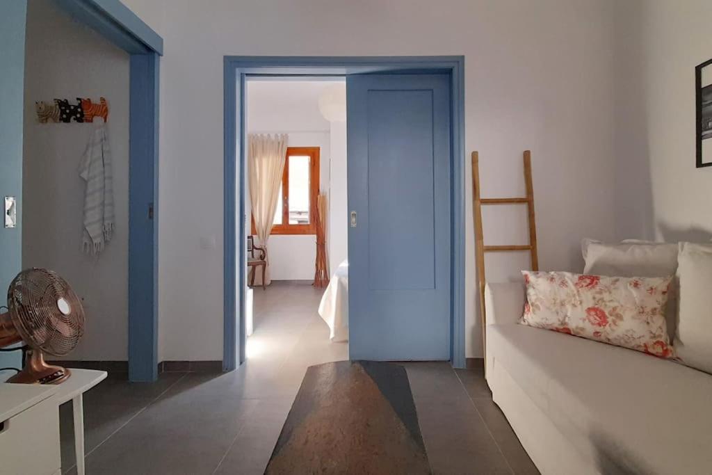 Postel nebo postele na pokoji v ubytování Chora Apartment