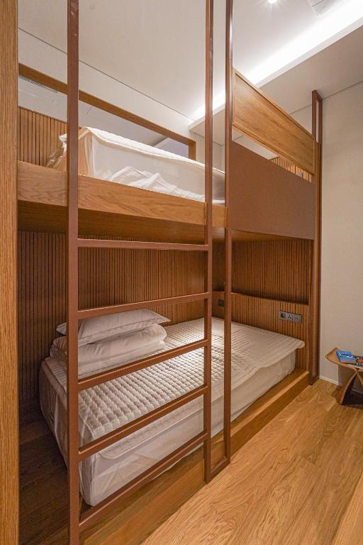Postel nebo postele na pokoji v ubytování Hotel Ground27