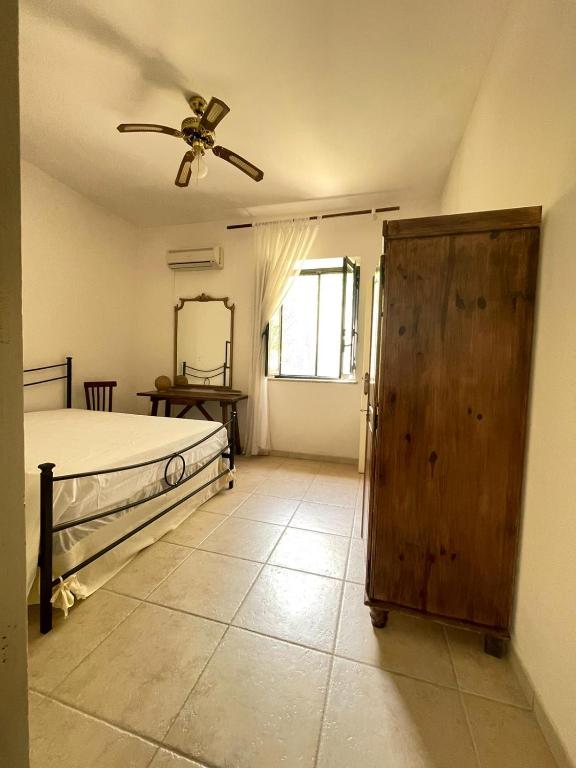 Postel nebo postele na pokoji v ubytování Masseria Scianne