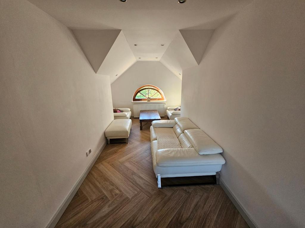 En eller flere senge i et værelse på Agroturystyka Kaszmir Janów Podlaski