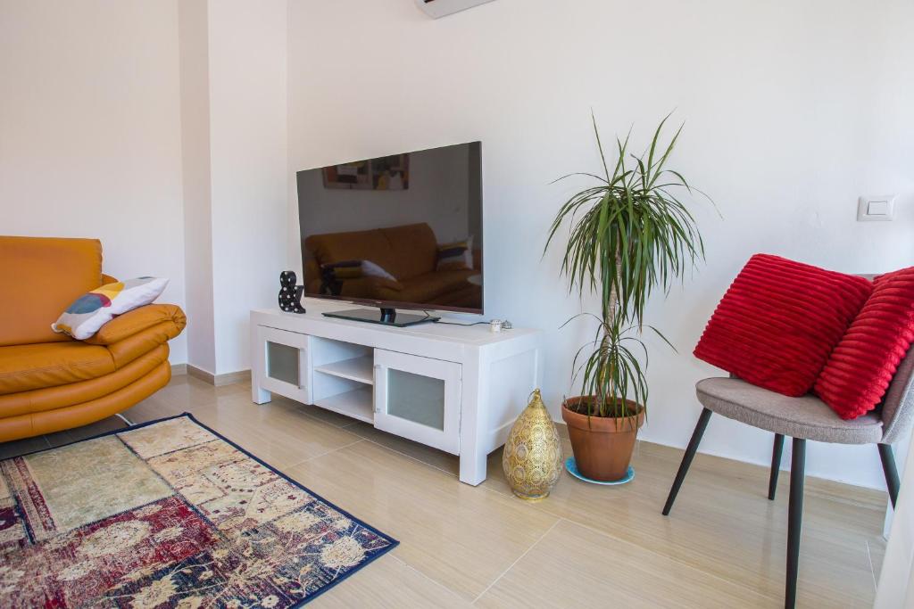 TV a/nebo společenská místnost v ubytování LUNA