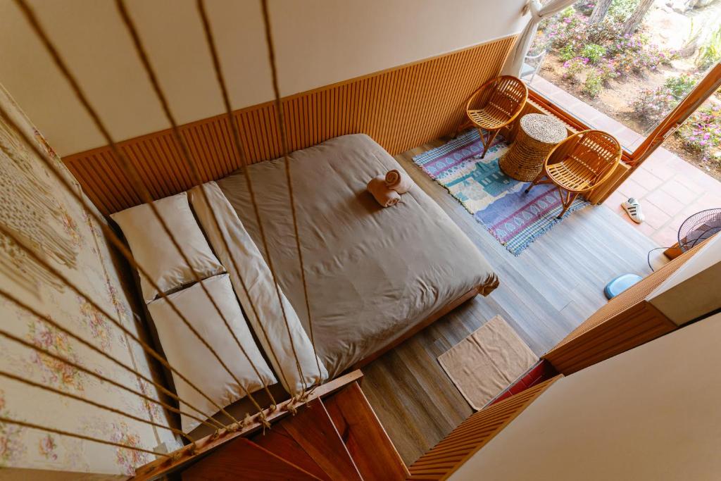 Giường trong phòng chung tại Hoàng Gia Trang