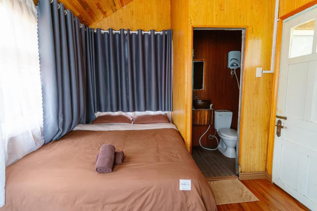 Letto o letti in una camera di Hoàng Gia Trang