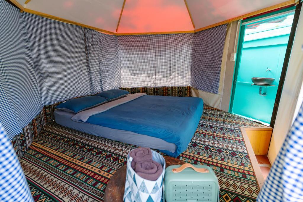 Letto o letti in una camera di Hoàng Gia Trang