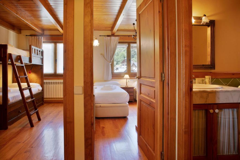 Posteľ alebo postele v izbe v ubytovaní Luderna - Apartamento Dera Pincèla