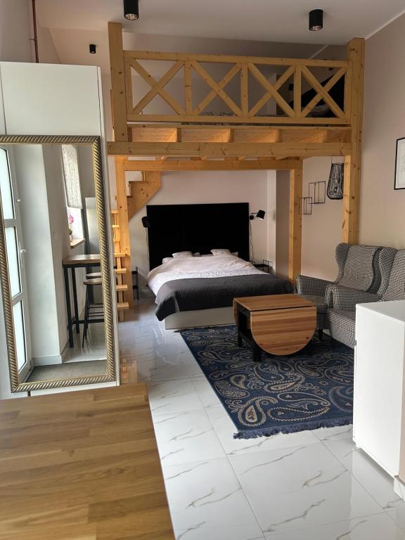 Postel nebo postele na pokoji v ubytování Apartament Ana Mrągowo Centrum