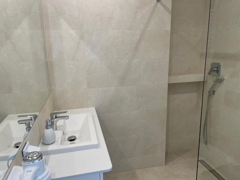 Kúpeľňa v ubytovaní Apartamenty AQUA MAZURY