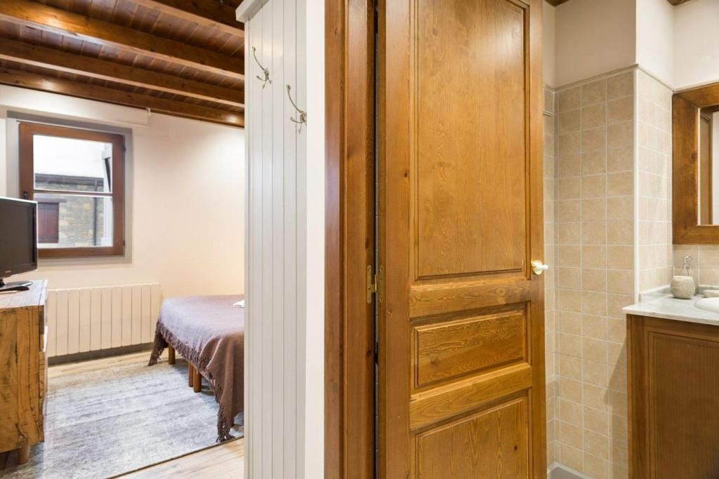 Postel nebo postele na pokoji v ubytování Luderna - Apartamento Val de Ruda B2 Pradets