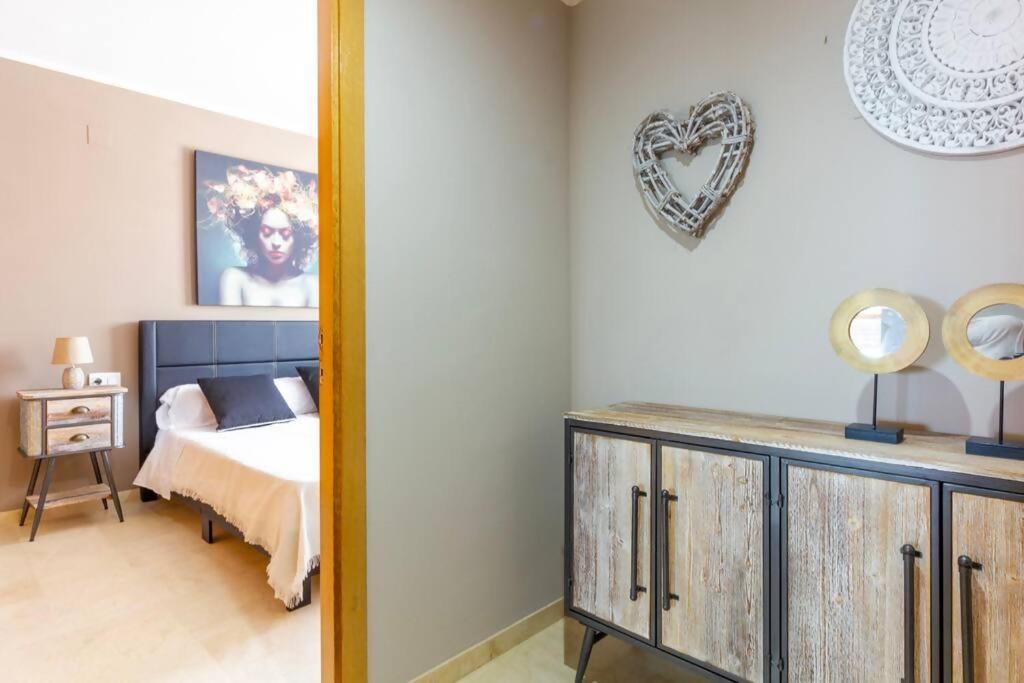 Postel nebo postele na pokoji v ubytování Oliva Apartamento Terrazamar