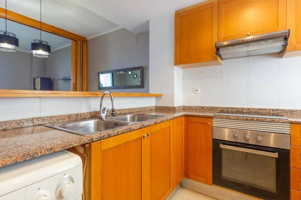 Kuchyň nebo kuchyňský kout v ubytování Oliva Apartamento Terrazamar