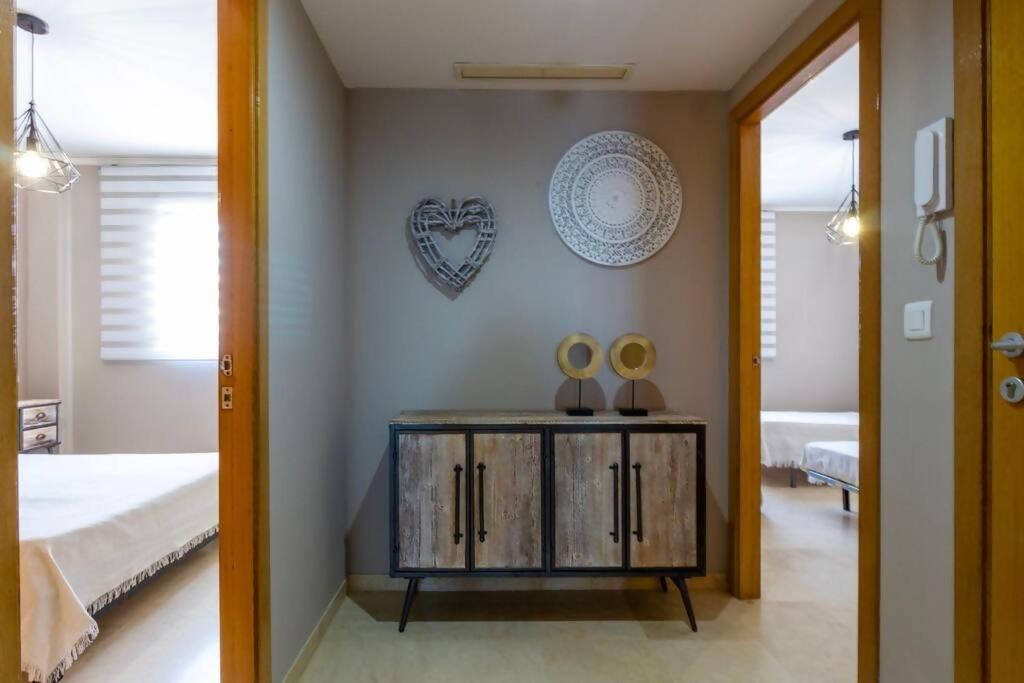 Postel nebo postele na pokoji v ubytování Oliva Apartamento Terrazamar