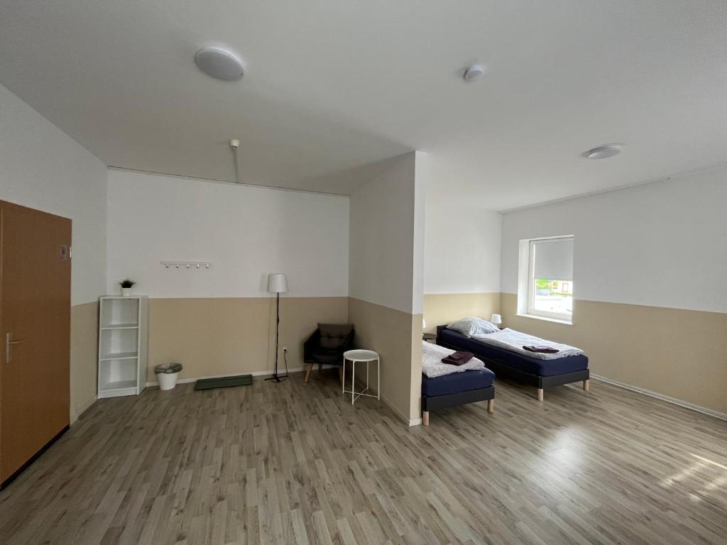 Posezení v ubytování Doppelzimmer mit Bad- Fernseher