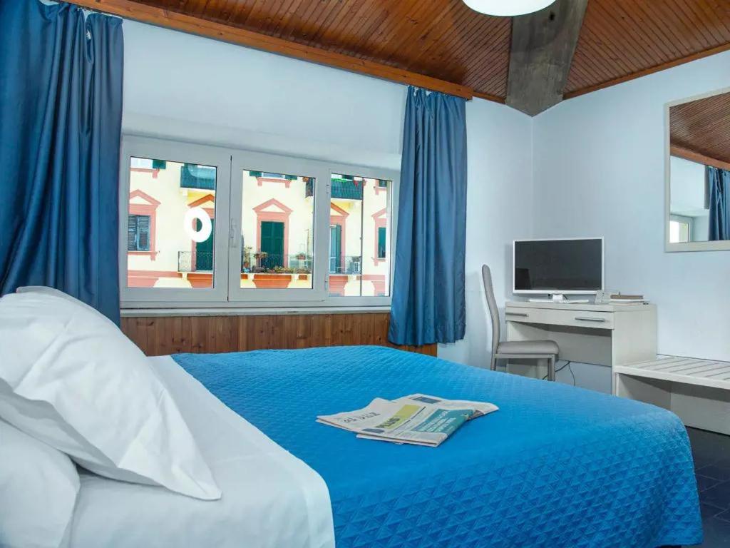 Postel nebo postele na pokoji v ubytování Hotel Venezia