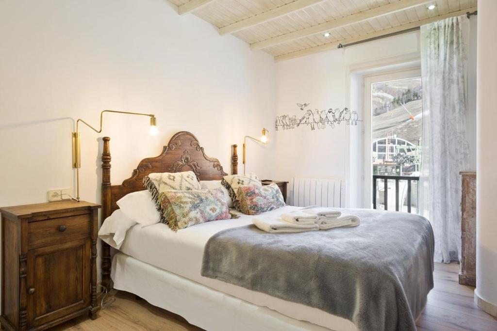 Posteľ alebo postele v izbe v ubytovaní Luderna - Apartamento Mirador de Aran