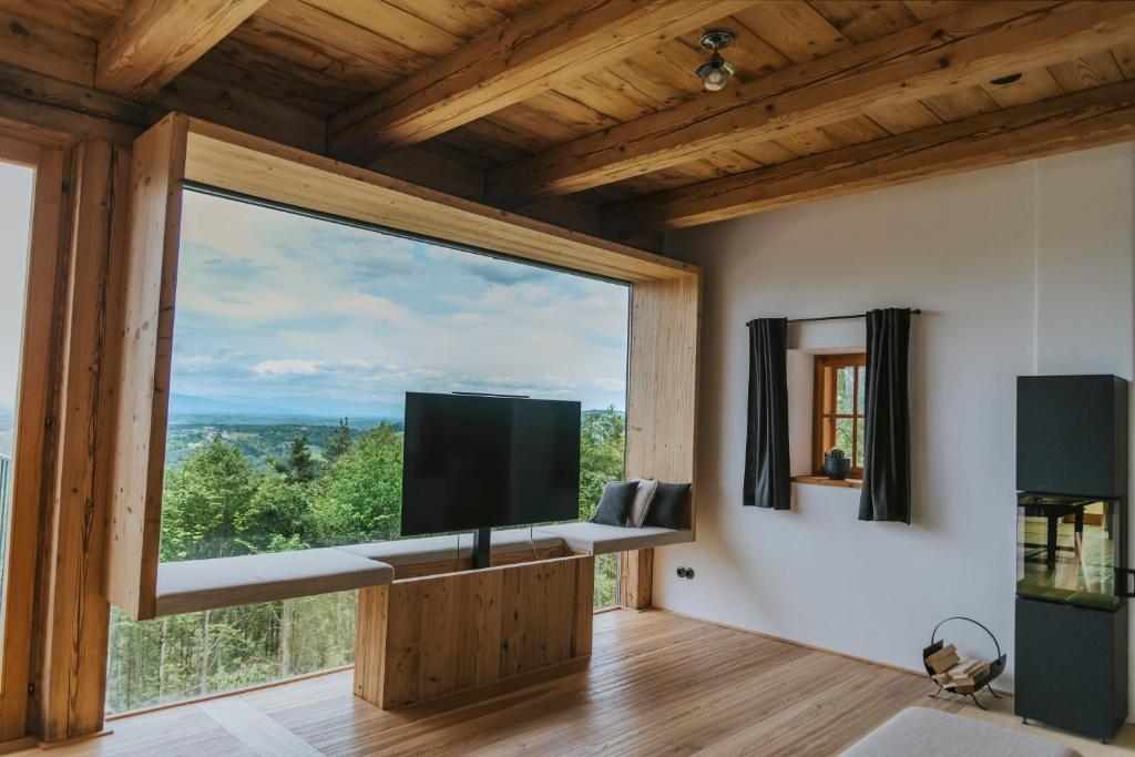 TV a/nebo společenská místnost v ubytování Das Hundert am Eichberg, Südsteiermark