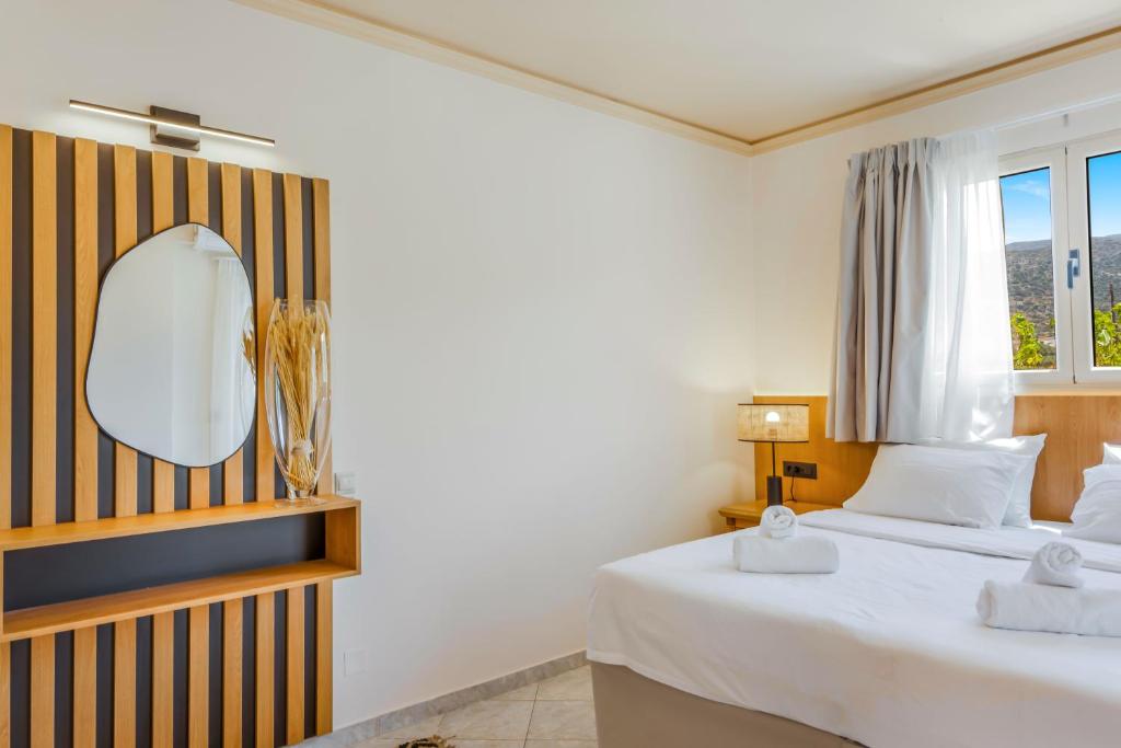Postel nebo postele na pokoji v ubytování Socrates Hotel Malia Beach