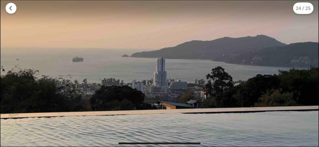 a view of a city and a body of water at Patong tower 2bedroom 2 bathrooms, corner view in Patong Beach