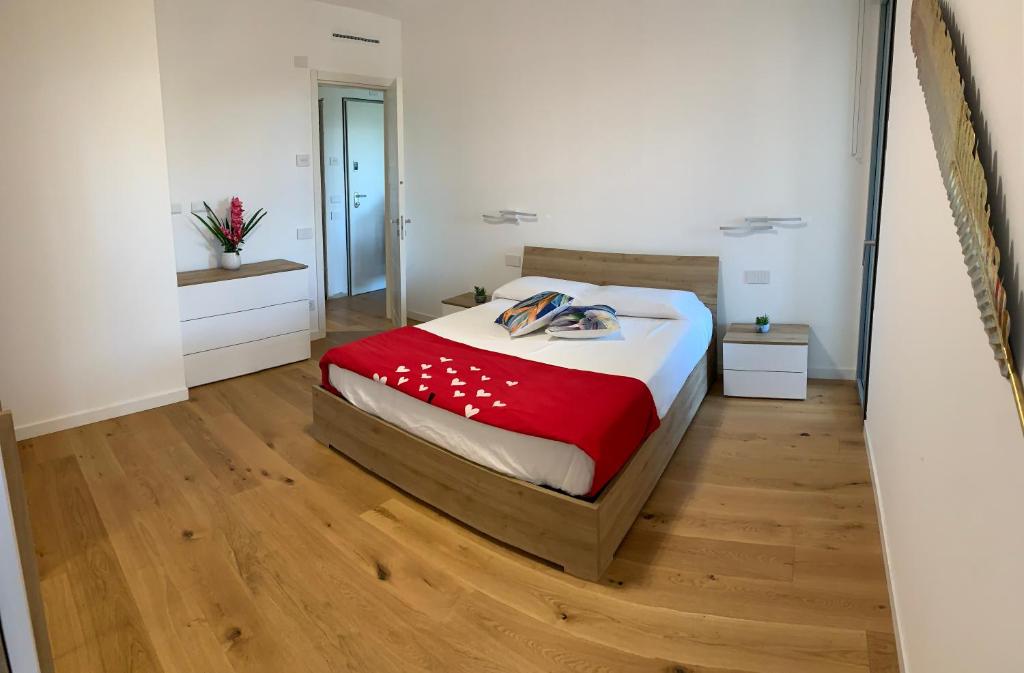 Postel nebo postele na pokoji v ubytování Venere Smeralda Living