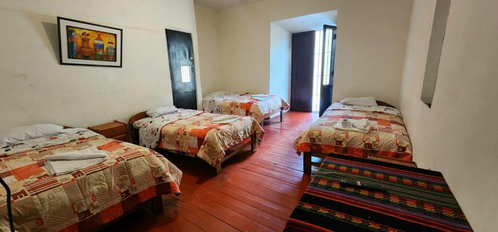 Postel nebo postele na pokoji v ubytování Hostel Imperial BACKPACKER