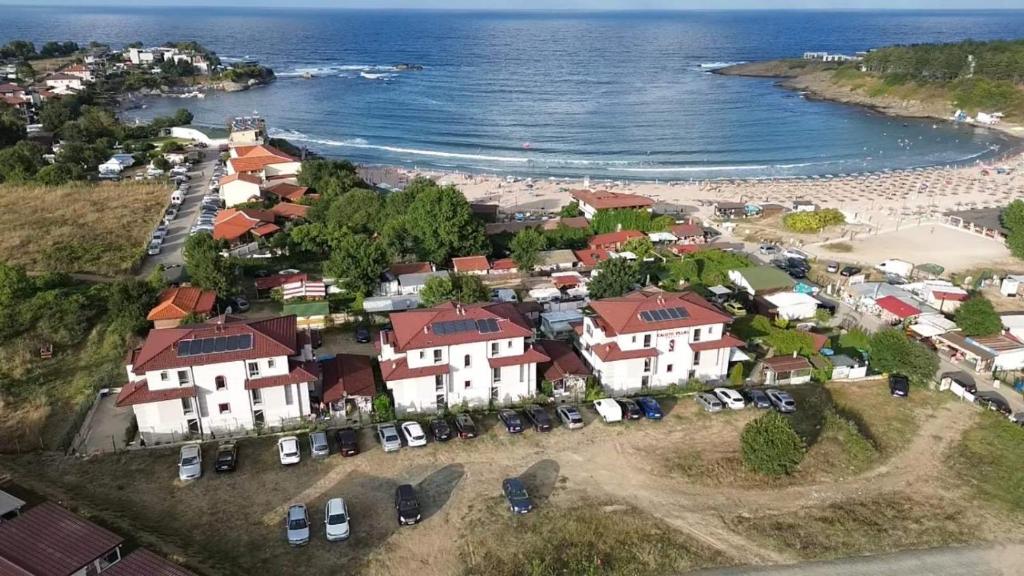 an aerial view of a town on the beach at Calisto Villas Arapya in Arapya
