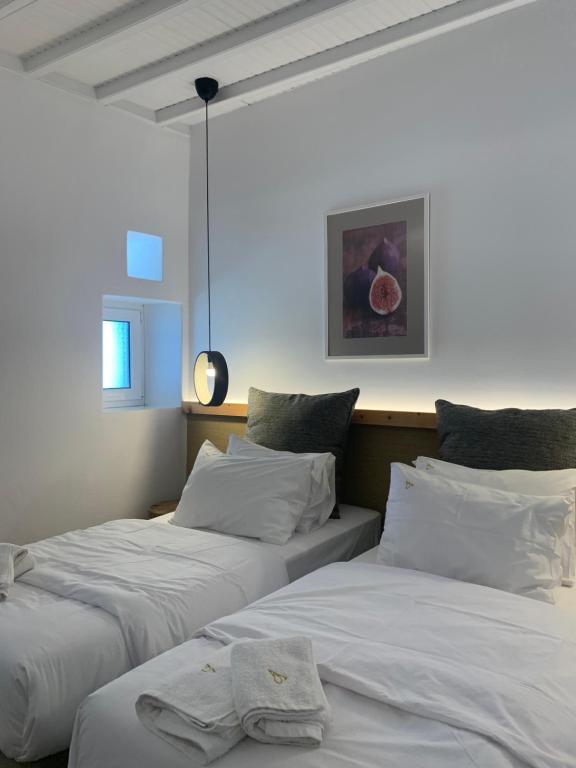 Postel nebo postele na pokoji v ubytování ALIRENE MYKONOS