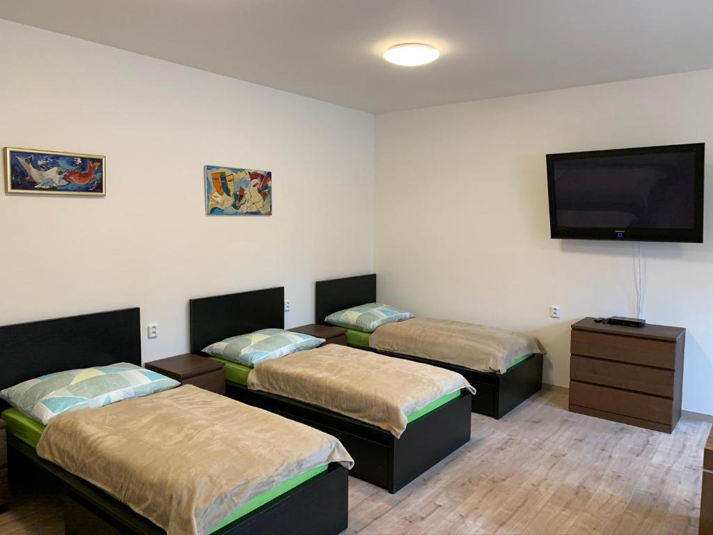 Postel nebo postele na pokoji v ubytování Apartements Studio 964