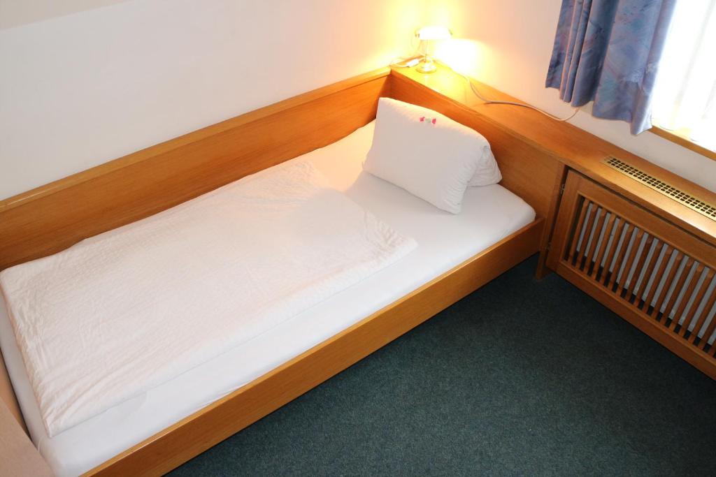 Postel nebo postele na pokoji v ubytování Pension - Alt - Strassgang