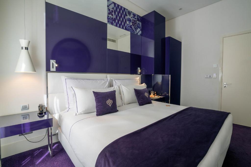 Postel nebo postele na pokoji v ubytování Portugal Boutique Hotel