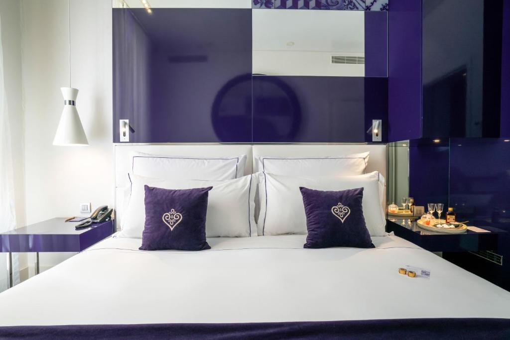 Postel nebo postele na pokoji v ubytování Portugal Boutique Hotel
