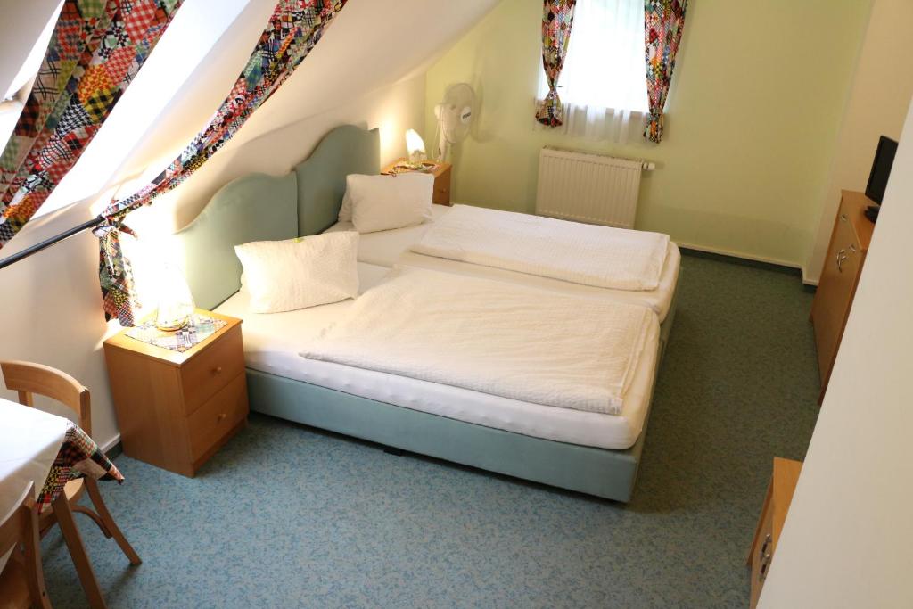 Katil atau katil-katil dalam bilik di Pension - Alt - Strassgang