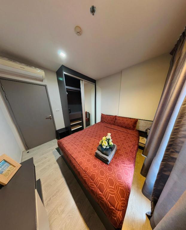 Postel nebo postele na pokoji v ubytování THE BASE apartments at central pattaya