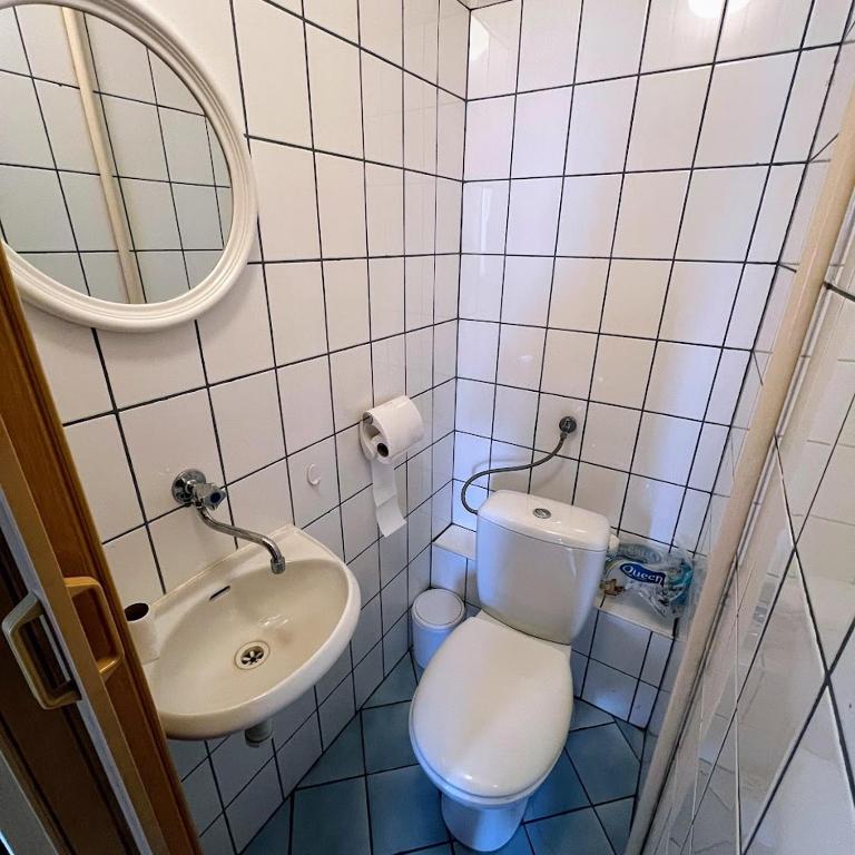 Koupelna v ubytování Apartament Centrum