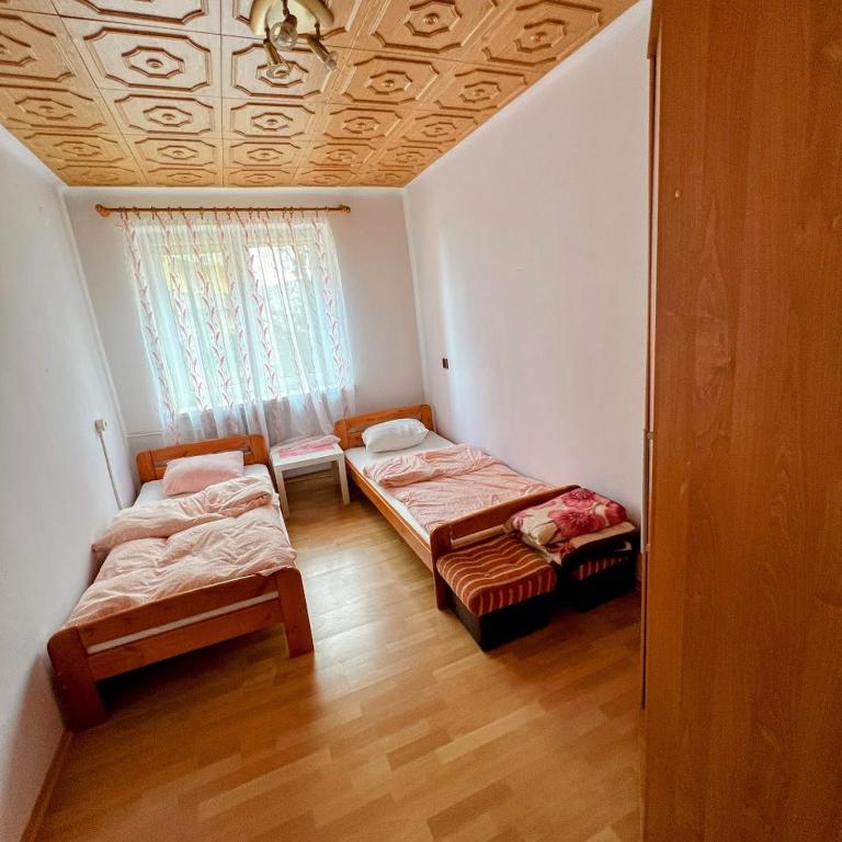 Postel nebo postele na pokoji v ubytování Apartament Centrum